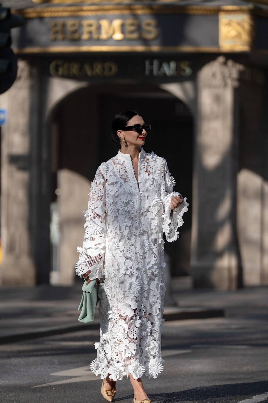 White lace midi dress, long sleeves with floral trim and openwork pattern