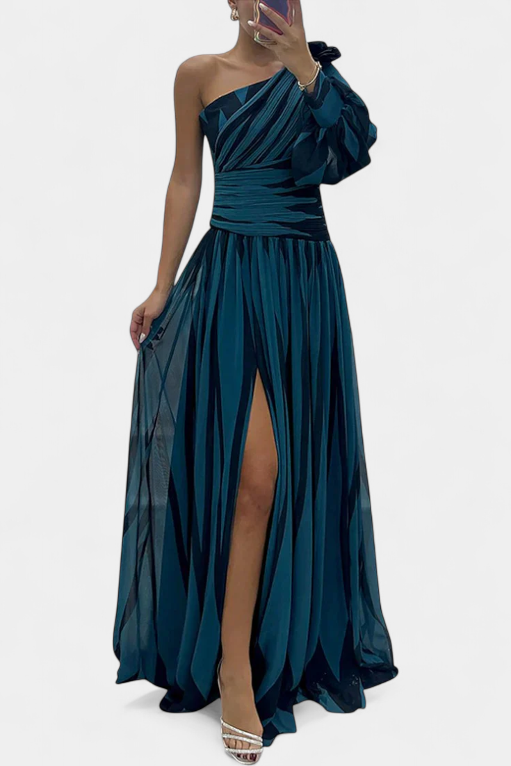 One-shoulder maxi dress in deep teal, gathered waist, ruffle sleeve, side slit.