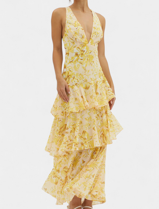 Yellow floral sleeveless maxi dress with V-neck and tiered ruffle skirt