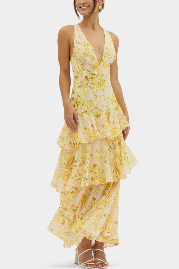 Yellow floral sleeveless maxi dress with V-neck and tiered ruffle skirt