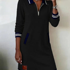 Black long-sleeve cotton dress, quarter-zip, contrast collar, striped cuffs and hem, side pockets.