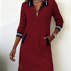 Red long-sleeve cotton dress, quarter-zip, contrast collar, striped cuffs and hem, side pockets.