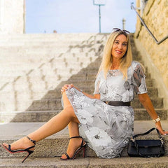 Gray floral midi dress with scoop neckline and gathered waist, short sleeves