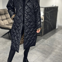 Kendall black quilted coat with leopard-print lining at the cuffs and hem