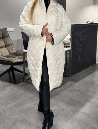 Kendall white quilted coat with leopard-print lining visible at the cuffs