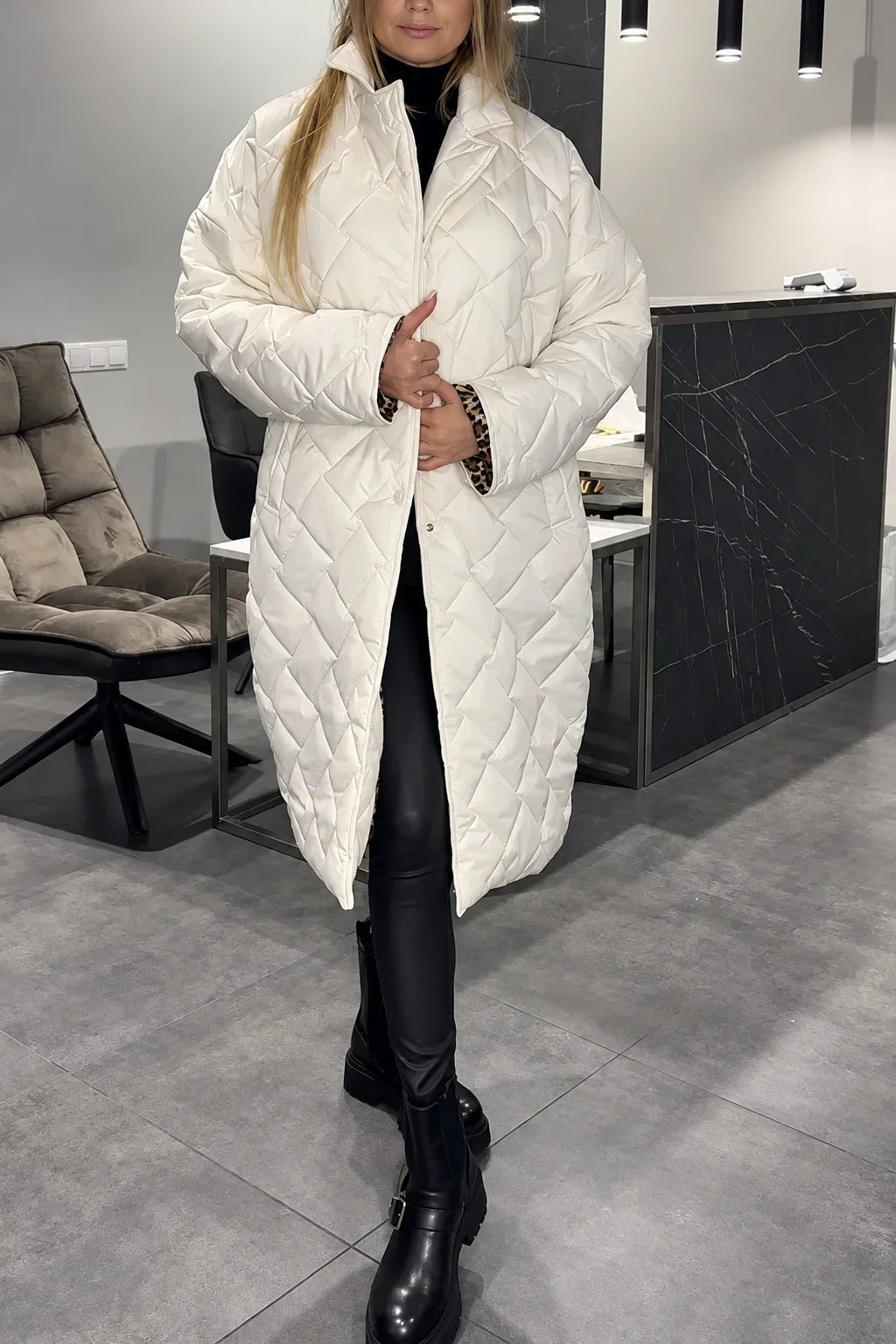 Kendall white quilted coat with leopard-print lining visible at the cuffs