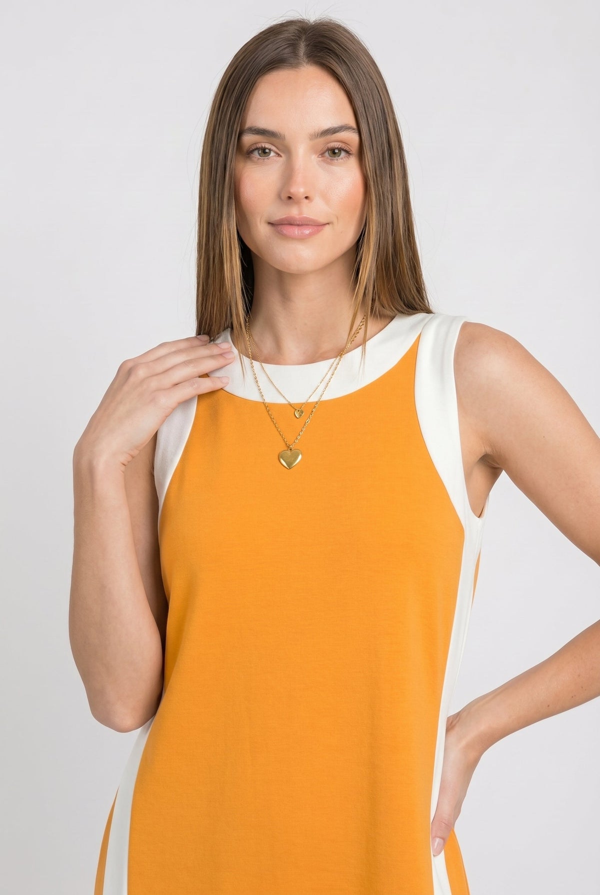 Orange sleeveless tunic dress with white crew neckline and contrast side strip detail