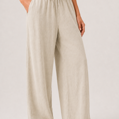 Light beige pull-on pants with elastic waistband and flowing wide legs