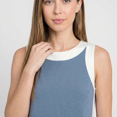 Blue sleeveless tunic dress with white neckline trim and contrast side stripe panels