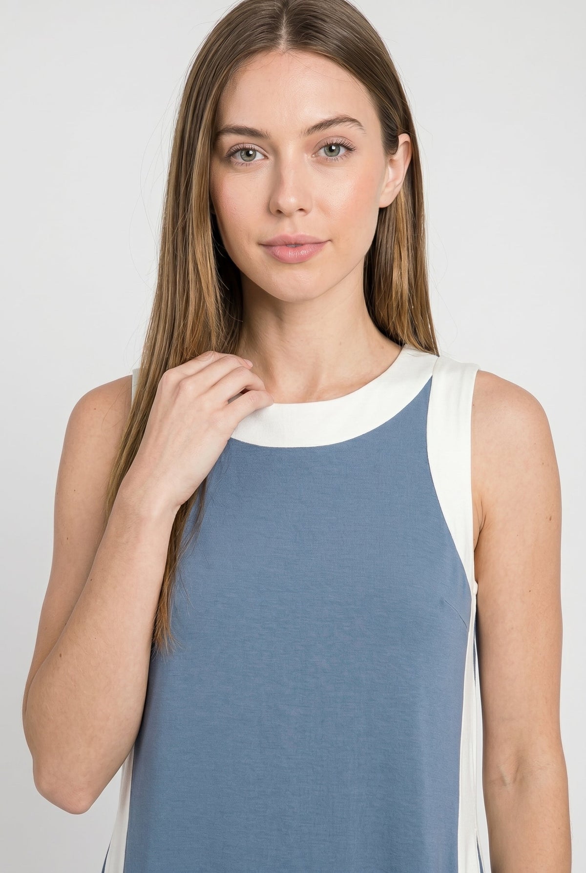 Blue sleeveless tunic dress with white neckline trim and contrast side stripe panels