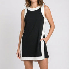 Black sleeveless dress with white trim and side stripe detail