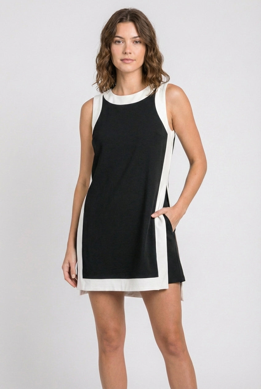 Black sleeveless dress with white trim and side stripe detail