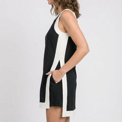 Black sleeveless dress with white side stripe and keyhole back detail