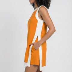Orange sleeveless tunic dress with white side stripes and hanging tie at hip