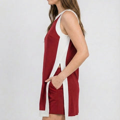 Crimson sleeveless dress with white side slits and crew neckline