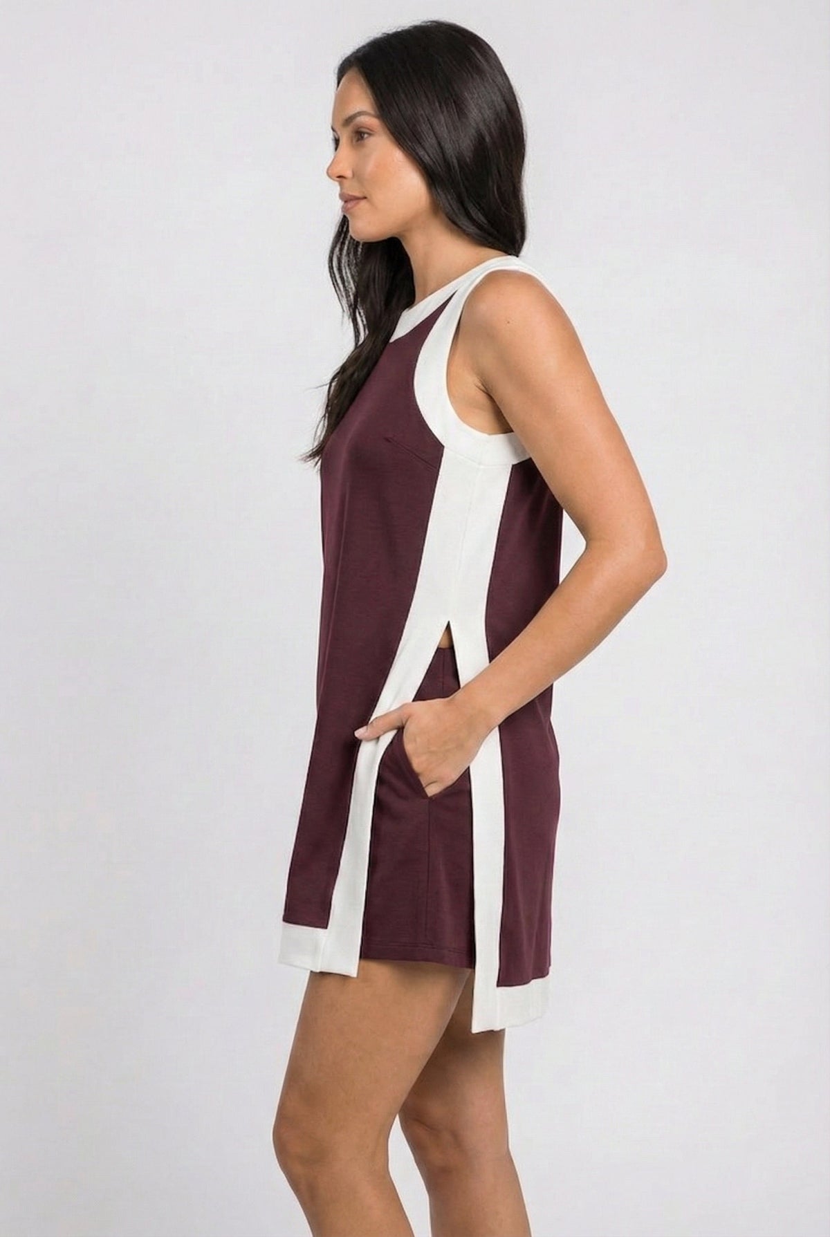 Maroon sleeveless dress with white side panels and crew neckline