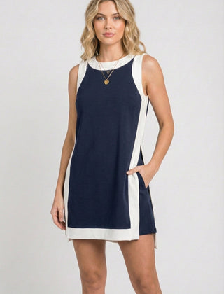 Sleeveless navy game day dress with white side panels and scoop neckline
