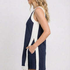 Sleeveless navy game day dress with white side panels and side slit detail