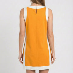 Orange sleeveless tunic dress with white back trim and center back keyhole detail