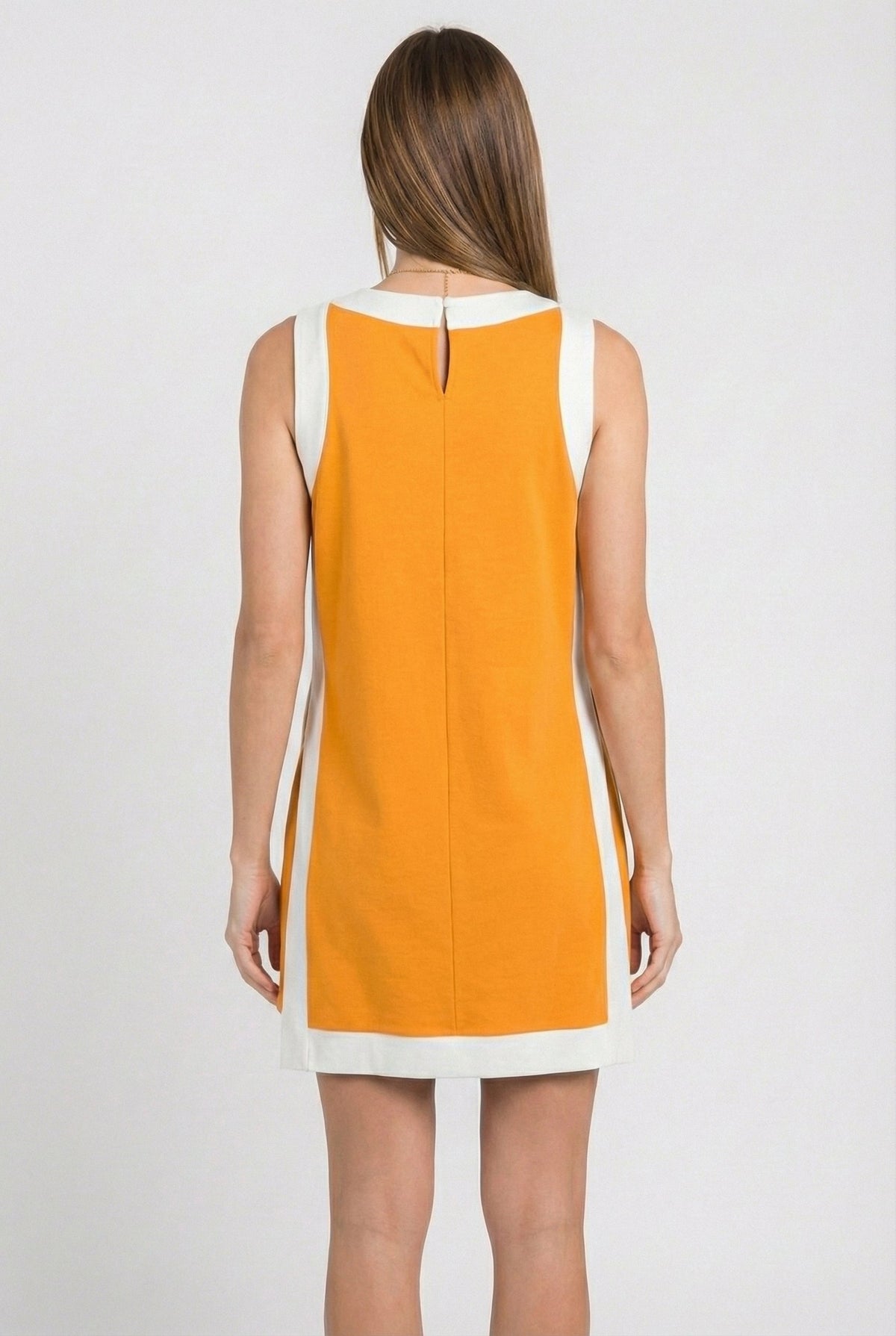Orange sleeveless tunic dress with white back trim and center back keyhole detail
