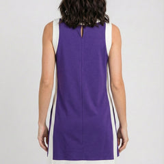 Back view of sleeveless purple game day dress with vertical white side panels