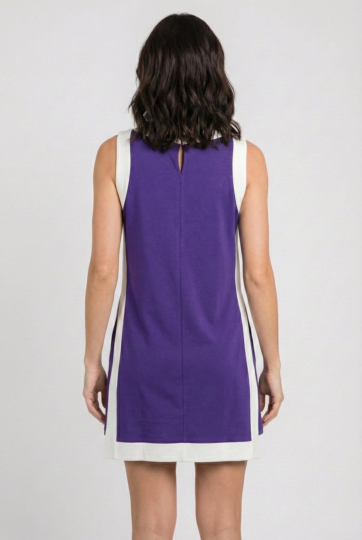 Back view of sleeveless purple game day dress with vertical white side panels