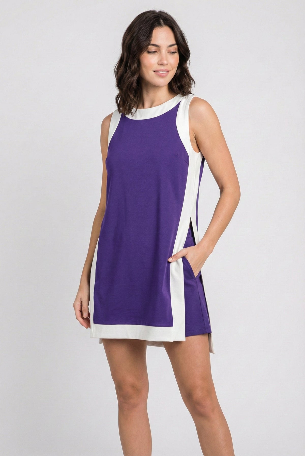 Sleeveless purple game day dress with white side panels and scoop neckline