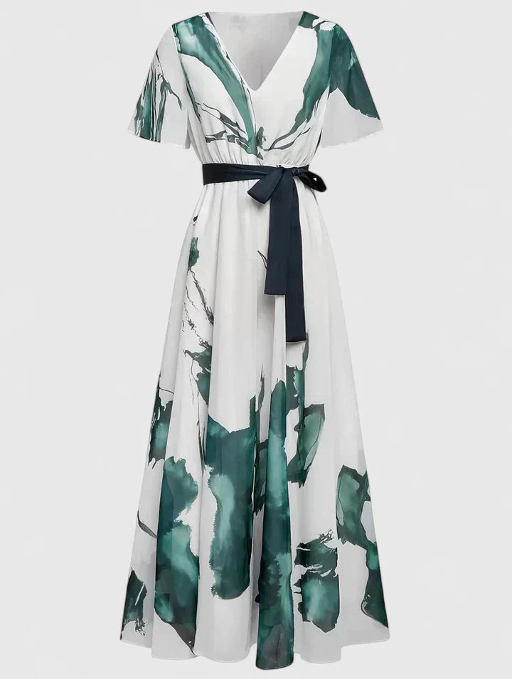 Wrap maxi dress with V-neck and short sleeves; cream with green print, navy waist tie