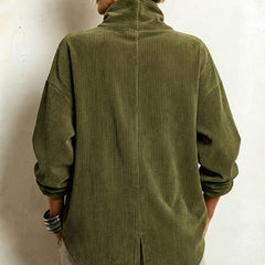 Olive corduroy button-up top, back view with mock neck and vertical center seam.