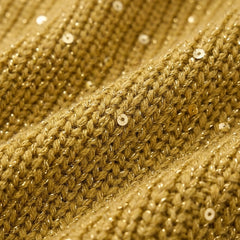 Close-up of gold sequin knit fabric with textured stitch detail