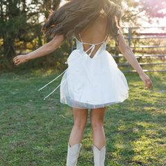 White backless tulle dress with thin crisscross straps