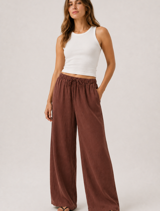 Brennan pants in spiced cognac brown, wide-leg with elastic drawstring waist.