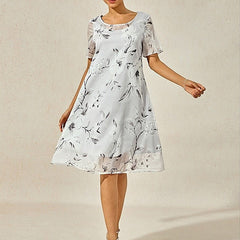 Gray floral midi dress with short sleeves and gathered skirt, full-length view