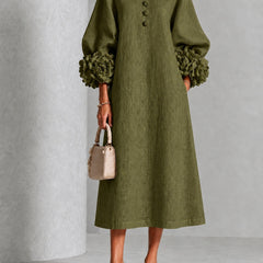 Olive midi dress with button front and puff sleeves, rosette cuff details