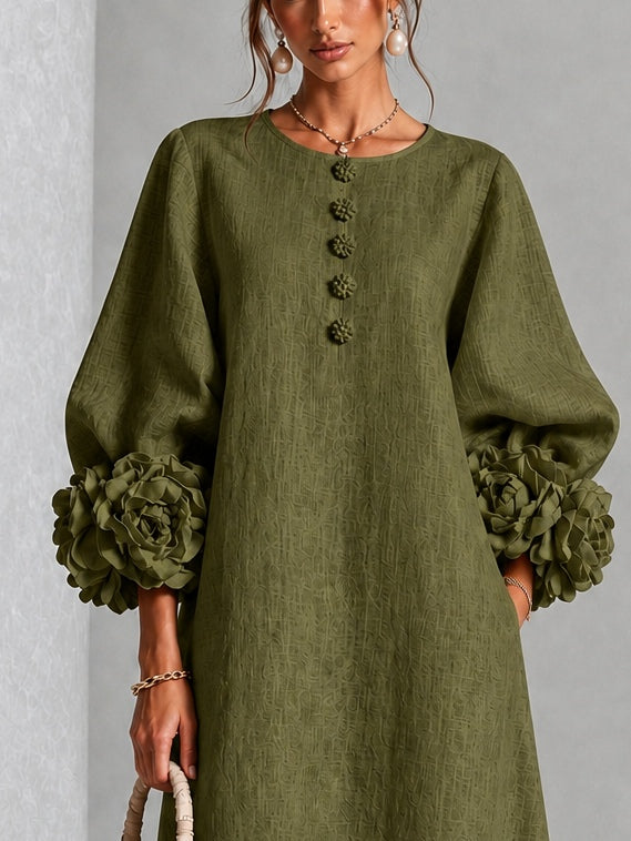 Olive midi dress close-up: round neckline, vertical button row, rosette sleeve cuffs