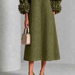 Olive midi dress with three-quarter view, button front and puff sleeves with rosette cuffs