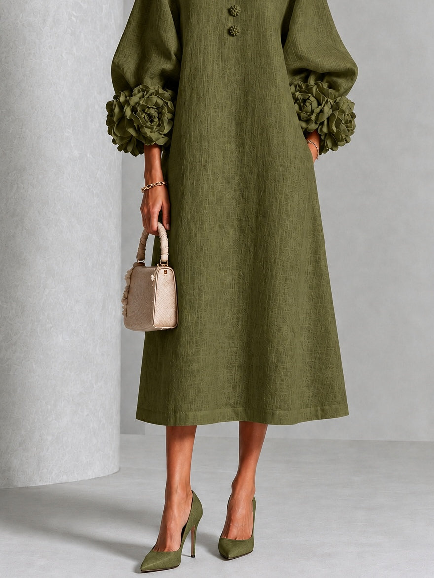 Olive midi dress with three-quarter view, button front and puff sleeves with rosette cuffs