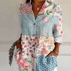 Floral patchwork summer blouse with button front, collared V-neck, and rolled sleeves
