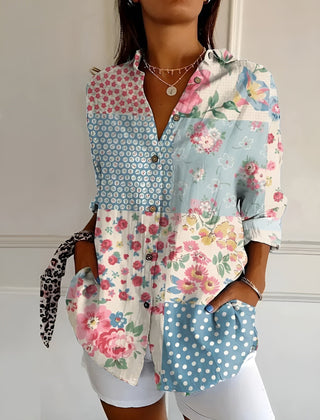 Floral patchwork summer blouse with button front, collared V-neck, and rolled sleeves