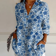 Blue floral lace print summer blouse with button front, collared V-neck, rolled sleeves