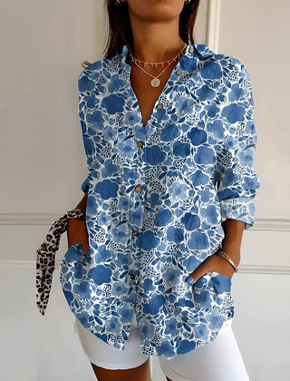 Blue floral lace print summer blouse with button front, collared V-neck, rolled sleeves