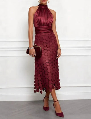 Red wine halter neck midi dress with scalloped scale pattern and gathered bodice