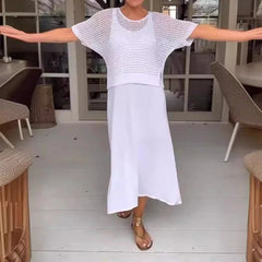 Elena two-piece set in white: open-knit short-sleeve top and high-slit midi skirt