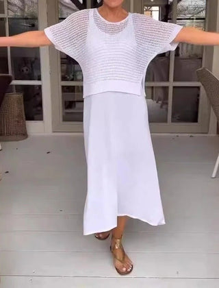 Elena two-piece set in white: open-knit short-sleeve top and high-slit midi skirt