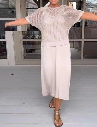 Elena two-piece set in cream: open-knit short-sleeve top and flowy midi skirt