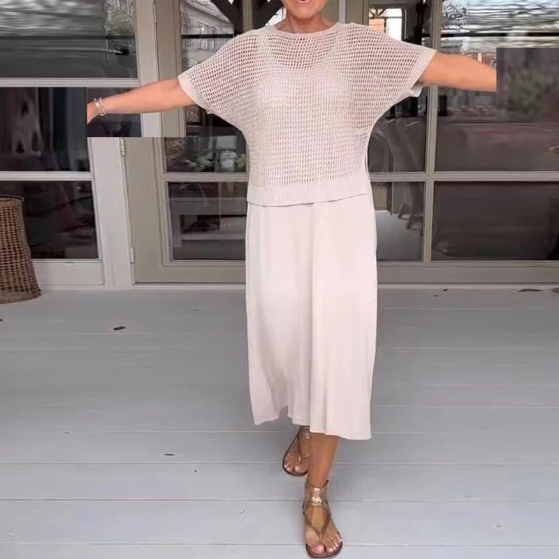 Elena two-piece set in cream: open-knit short-sleeve top and flowy midi skirt