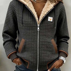 Sherpa-lined quilted zip-up hooded jacket in dark gray with tan leatherette trim, full zipper