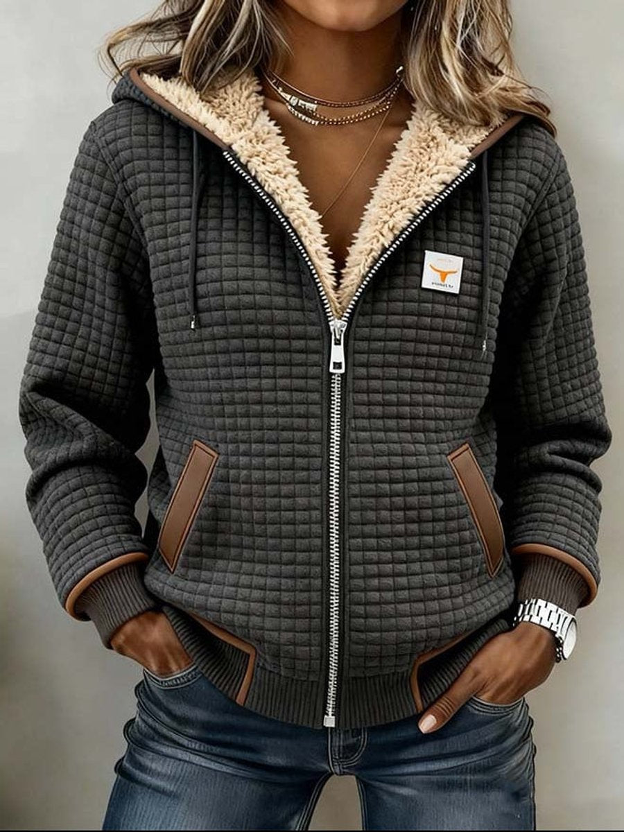Sherpa-lined quilted zip-up hooded jacket in dark gray with tan leatherette trim, full zipper