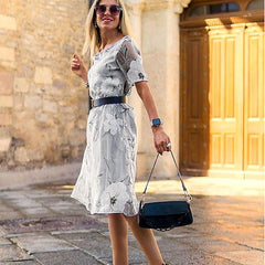 Gray floral midi dress with cinched waist, short sleeves, A-line hem