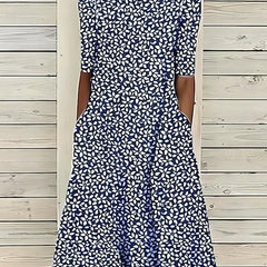 Coastal Bloom dress in dark blue with white small floral pattern, short sleeves